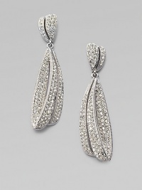 A unique, wave shape embellished in brilliant crystals throughout for an elegant style. Rhodium plated brassCrystalsLength, about 1½ Post backImported A unique, wave shape embellished in brilliant crystals throughout for an elegant style. Rhodium plated brassCrystalsLength, about 1½ Post backImported