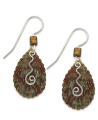 Feeling special. Jody Coyote embraces texture with its drop earrings, set in sterling silver with a teardrop silhouette in green patina-finished bronze. A squiggle embellishment adds a stylish touch. Approximate drop: 1-1/2 inches. Feeling special. Jody Coyote embraces texture with its drop earrings, set in sterling silver with a teardrop silhouette in green patina-finished bronze. A squiggle embellishment adds a stylish touch. Approximate drop: 1-1/2 inches.