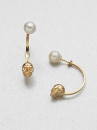 From the Memento Mori Collection. A fabulous, fun half hoop design, with a creamy demure pearl on one end and a glowing skull on the other.Freshwater pearls9k goldplatedLength, about ¾Reverse post backMade in Italy From the Memento Mori Collection. A fabulous, fun half hoop design, with a creamy demure pearl on one end and a glowing skull on the other.Freshwater pearls9k goldplatedLength, about ¾Reverse post backMade in Italy