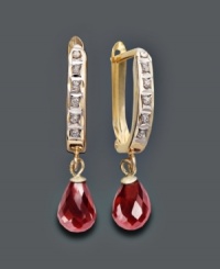 Bold and elegant. Add a special touch to any look with red-hot garnet gemstones (2-5/8 ct. t.w.). Hoop setting crafted in 14k gold with sparkling diamond accents. Approximate drop: 1 inch. Bold and elegant. Add a special touch to any look with red-hot garnet gemstones (2-5/8 ct. t.w.). Hoop setting crafted in 14k gold with sparkling diamond accents. Approximate drop: 1 inch.