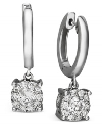 When you can't get enough of your classic hoop earrings, mix it up with a little sparkle. Round-cut diamond drops (1/2 ct. t.w.) light up this traditional look. Crafted in 14k white gold. Approximate drop: 16 mm. When you can't get enough of your classic hoop earrings, mix it up with a little sparkle. Round-cut diamond drops (1/2 ct. t.w.) light up this traditional look. Crafted in 14k white gold. Approximate drop: 16 mm.