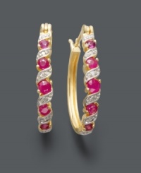 Add a simple twist for a touch of extra glamour. Victoria Townsend's stylish hoop earrings highlight round-cut rubies (3/4 ct. t.w.) accented by sparkling diamonds. Crafted in 18k gold over sterling silver. Approximate diameter: 1 inch. Add a simple twist for a touch of extra glamour. Victoria Townsend's stylish hoop earrings highlight round-cut rubies (3/4 ct. t.w.) accented by sparkling diamonds. Crafted in 18k gold over sterling silver. Approximate diameter: 1 inch.