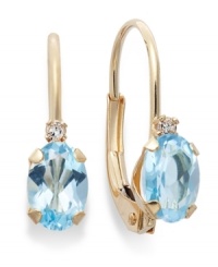 Sparkling perfection. Add a vibrant pop of color to your look with oval-cut blue topaz (9/10 ct. t.w.) and sparkling diamond accents. Crafted in a 14k gold leverback setting. Approximate drop: 3/4 inch. Sparkling perfection. Add a vibrant pop of color to your look with oval-cut blue topaz (9/10 ct. t.w.) and sparkling diamond accents. Crafted in a 14k gold leverback setting. Approximate drop: 3/4 inch.