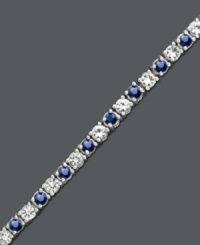 A tennis bracelet to tantalize the senses. This sterling silver bracelet features interchanging round-cut white sapphire (2-3/4 ct. t.w.) and sapphire (2-1/2 ct. t.w.). Approximate length: 7 inches. A tennis bracelet to tantalize the senses. This sterling silver bracelet features interchanging round-cut white sapphire (2-3/4 ct. t.w.) and sapphire (2-1/2 ct. t.w.). Approximate length: 7 inches.
