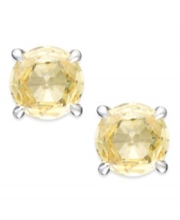 Simply elegant. Arabella's stud earrings sparkle with round-cut yellow Swarovski zirconias for a vibrant touch. Set in sterling silver. Approximate diameter: 1/3 inch. Simply elegant. Arabella's stud earrings sparkle with round-cut yellow Swarovski zirconias for a vibrant touch. Set in sterling silver. Approximate diameter: 1/3 inch.