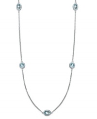 Short and traditional. This luminous strand necklace features round and oval-cut blue topaz (5 ct. t.w.) strung from a delicate sterling silver chain. Approximate length: 17 inches. Short and traditional. This luminous strand necklace features round and oval-cut blue topaz (5 ct. t.w.) strung from a delicate sterling silver chain. Approximate length: 17 inches.