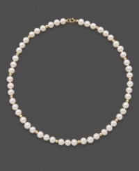 For the little girl who wants to look just like mom. This simple strand of cultured freshwater pearls (5-6 mm) makes a perfect gift. Set in 14k gold with gold accent beads. Approximate length: 14 inches. For the little girl who wants to look just like mom. This simple strand of cultured freshwater pearls (5-6 mm) makes a perfect gift. Set in 14k gold with gold accent beads. Approximate length: 14 inches.