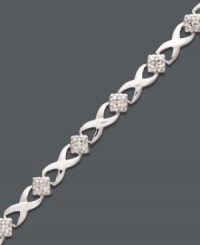 Seal the deal with a sweet kiss. Victoria Townsend's tasteful tennis bracelet features a cut-out X link design with sparkling diamond accents. Crafted in sterling silver. Approximate length: 7-1/4 inches. Seal the deal with a sweet kiss. Victoria Townsend's tasteful tennis bracelet features a cut-out X link design with sparkling diamond accents. Crafted in sterling silver. Approximate length: 7-1/4 inches.