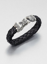 The perfect meeting of hand-braided leather with sterling silver, as a large dragon clasp accents this masculine bracelet, tailored for the gentleman who exudes individuality and personal style.Sterling silverLeatherDiameter, about 3Lobster claspMade in USA The perfect meeting of hand-braided leather with sterling silver, as a large dragon clasp accents this masculine bracelet, tailored for the gentleman who exudes individuality and personal style.Sterling silverLeatherDiameter, about 3Lobster claspMade in USA