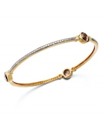 A slim row of sparkle makes a big impact. Victoria Townsend's pretty bangle bracelet slips over the wrist and shines in round-cut smokey quartz (3-9/10 ct. t.w.) with diamond accents. Set in 18k gold over sterling silver. Approximate length: 8 inches. Approximate diameter: 2-1/2 inches. A slim row of sparkle makes a big impact. Victoria Townsend's pretty bangle bracelet slips over the wrist and shines in round-cut smokey quartz (3-9/10 ct. t.w.) with diamond accents. Set in 18k gold over sterling silver. Approximate length: 8 inches. Approximate diameter: 2-1/2 inches.