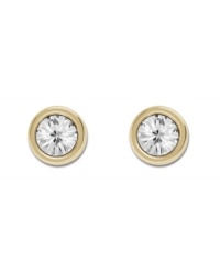 Pretty as a picture! Swarovski's framed crystal stud earrings are equally chic for a day at the office or a night on the town. Made in gold tone mixed metal. Approximate diameter: 1/2 inch. Pretty as a picture! Swarovski's framed crystal stud earrings are equally chic for a day at the office or a night on the town. Made in gold tone mixed metal. Approximate diameter: 1/2 inch.