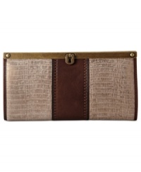 Upgrade your style status with this croc-embossed leather clutch from Fossil, featuring vintage-inspired detailing. Surprisingly spacious with multiple pockets, it's equipped to stash your evening essentials with ease. Upgrade your style status with this croc-embossed leather clutch from Fossil, featuring vintage-inspired detailing. Surprisingly spacious with multiple pockets, it's equipped to stash your evening essentials with ease.