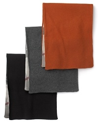 Burberry brings options to your autumn look, with a cozy cashmere scarf that reverses from a solid knit to the classic check pattern. Burberry brings options to your autumn look, with a cozy cashmere scarf that reverses from a solid knit to the classic check pattern.