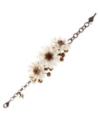 Beauty is in bloom. This bracelet from Betsey Johnson is crafted from brown gold-tone mixed metal with topaz-colored beads and crystals, as well as pearl-tone petals, adding a vibrant touch. Approximate length: 8 inches. Beauty is in bloom. This bracelet from Betsey Johnson is crafted from brown gold-tone mixed metal with topaz-colored beads and crystals, as well as pearl-tone petals, adding a vibrant touch. Approximate length: 8 inches.