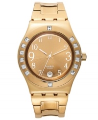 The golden shine on this Fancy Me collection Swatch watch complements the added Swarovski sparkle. The golden shine on this Fancy Me collection Swatch watch complements the added Swarovski sparkle.