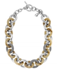 Jungle love. This summer calls for an intricate blend of chic earth tones and shimmer. Michael Kors trendy toggle necklace hits the nail on the head with its acetate horn and glass-accented links. Crafted in silver tone mixed metal. Approximate length: 17 inches. Jungle love. This summer calls for an intricate blend of chic earth tones and shimmer. Michael Kors trendy toggle necklace hits the nail on the head with its acetate horn and glass-accented links. Crafted in silver tone mixed metal. Approximate length: 17 inches.
