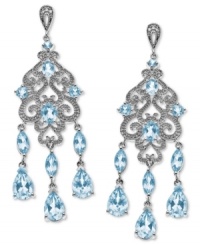 Truly spectacular sparkle. Light up the night with these luminous chandelier earrings in marquise, oval and round-cut blue topaz (8-1/4 ct. t.w.) with sparkling diamond accents. Set in sterling silver. Approximate drop: 2-1/8 inches. Truly spectacular sparkle. Light up the night with these luminous chandelier earrings in marquise, oval and round-cut blue topaz (8-1/4 ct. t.w.) with sparkling diamond accents. Set in sterling silver. Approximate drop: 2-1/8 inches.