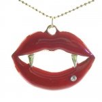DaisyJewel Vampire's Kiss Pendant Necklace - Glossy Cherry Red Lips with Golden Fangs and Accented with a Single Sparkling Crystal - Hangs from a Long Gold Ball Chain that is Both Delicate and Sturdy - Betsey Johnson Inspired - Great for Halloween or Ever DaisyJewel Vampire's Kiss Pendant Necklace - Glossy Cherry Red Lips with Golden Fangs and Accented with a Single Sparkling Crystal - Hangs from a Long Gold Ball Chain that is Both Delicate and Sturdy - Betsey Johnson Inspired - Great for Halloween or Ever