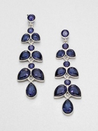 From the Black Tie Optional Collection. Graceful leaves in deep sapphire blue are arranged along an elegant branch in this dramatic drop design.Glass and plasticSilvertoneLength, about 2.75Post backImported From the Black Tie Optional Collection. Graceful leaves in deep sapphire blue are arranged along an elegant branch in this dramatic drop design.Glass and plasticSilvertoneLength, about 2.75Post backImported
