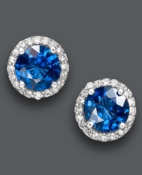 Studs add simple, yet spectacular, definition to your look. Effy Collection's chic design highlights round-cut sapphires (2 ct. t.w.) encircled by round-cut diamonds (1/5 ct. t.w.). Crafted in 14k white gold. Approximate diameter: 1/3 inch.