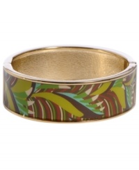 Channel the exoticism and energy of Brasil in Haskell's inspired skinny bangle. The Palm bangle features a brown and green palm leaf print design, set in gold tone mixed metal with a hinge clasp. Approximate diameter: 2-1/2 inches. Approximate length: 8 inches. Item comes packaged in a green gift box.
