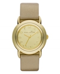 Metallic shimmer lights up this golden watch by Marc by Marc Jacobs. Metallic gold leather strap and round gold ion-plated stainless steel case. Gold tone mirrored dial features gold tone logo letters at markers and three hands. Quartz movement. Water resistant to 50 meters. Two-year limited warranty. Metallic shimmer lights up this golden watch by Marc by Marc Jacobs. Metallic gold leather strap and round gold ion-plated stainless steel case. Gold tone mirrored dial features gold tone logo letters at markers and three hands. Quartz movement. Water resistant to 50 meters. Two-year limited warranty.