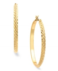 A textured design takes a classic hoop silhouette in a new direction with these Charter Club earrings. Crafted in gold tone mixed metal. Approximate diameter: 1-1/2 inches. A textured design takes a classic hoop silhouette in a new direction with these Charter Club earrings. Crafted in gold tone mixed metal. Approximate diameter: 1-1/2 inches.