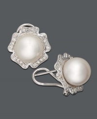The perfect look for spring -- frame your face with fresh flowers! These pretty stud earrings highlight a cultured South Sea pearl (9-10 mm) accented by sparkling round-cut diamonds (1/3 ct. t.w.). Crafted in 14k white gold. Approximate diameter: 3/4 inch. The perfect look for spring -- frame your face with fresh flowers! These pretty stud earrings highlight a cultured South Sea pearl (9-10 mm) accented by sparkling round-cut diamonds (1/3 ct. t.w.). Crafted in 14k white gold. Approximate diameter: 3/4 inch.