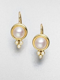 Luminous elegance in this diamond accented cultured pearl design in radiant 18k gold. Cultured pearls18k goldDiamonds, .09 tcwLength, about .8Hook backMade in Italy Luminous elegance in this diamond accented cultured pearl design in radiant 18k gold. Cultured pearls18k goldDiamonds, .09 tcwLength, about .8Hook backMade in Italy