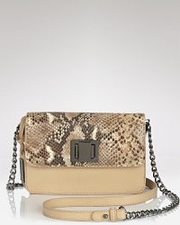 Make an exotic your next statement with this snake embossed bag from Badgley Mischka. In perfect step with this season's mini bag trend, this style is sure to pique animal instincts. Make an exotic your next statement with this snake embossed bag from Badgley Mischka. In perfect step with this season's mini bag trend, this style is sure to pique animal instincts.