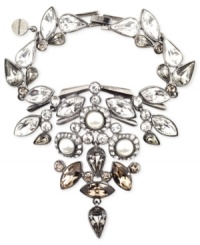 Futuristic flair. Givenchy goes for postmodern appeal with this flex bracelet crafted from hematite-tone mixed metal, and featuring glass pearls and stones for a bold statement. Approximate length: 7-1/4 inches. Approximate drop: 1-1/2 inches. Futuristic flair. Givenchy goes for postmodern appeal with this flex bracelet crafted from hematite-tone mixed metal, and featuring glass pearls and stones for a bold statement. Approximate length: 7-1/4 inches. Approximate drop: 1-1/2 inches.