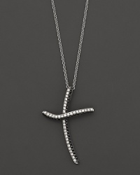 Black and white diamonds set in 14K. white gold. Black and white diamonds set in 14K. white gold.