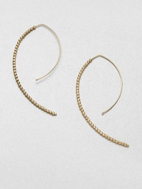 Delicate faceted beads line up along the arc of an artfully shaped hoop with a modern appeal.14k yellow goldLength, about 2Hoop wireMade in USA Delicate faceted beads line up along the arc of an artfully shaped hoop with a modern appeal.14k yellow goldLength, about 2Hoop wireMade in USA