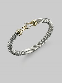 From the Cable Buckle Collection. A classic cable bangle of sterling silver, clasped with a pavé diamond buckle and accented with 18k yellow gold. Diamonds, 0.09 tcw Sterling silver and 18k yellow gold Cable, 7mm Diameter, about 2¼ Hook clasp Made in USA From the Cable Buckle Collection. A classic cable bangle of sterling silver, clasped with a pavé diamond buckle and accented with 18k yellow gold. Diamonds, 0.09 tcw Sterling silver and 18k yellow gold Cable, 7mm Diameter, about 2¼ Hook clasp Made in USA