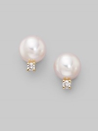 From the Akoya Collection. Classic white cultured pearl studs with sparkling diamond accents set in 18k gold. 6mm white round cultured pearls Diamonds, 0.06 tcw 18k yellow gold Post back Imported From the Akoya Collection. Classic white cultured pearl studs with sparkling diamond accents set in 18k gold. 6mm white round cultured pearls Diamonds, 0.06 tcw 18k yellow gold Post back Imported