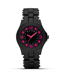 A chic watch from MARC BY MARC JACOBS, the Pelly is cast in blakc silicon with hot pink accents. A chic watch from MARC BY MARC JACOBS, the Pelly is cast in blakc silicon with hot pink accents.