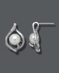 Class, sophistication, and subtlety. These dainty stud earrings feature a cultured freshwater pearl (8-9 mm) cradled in a diamond-accented sterling silver teardrop. Approximate diameter: 3/4 inch. Class, sophistication, and subtlety. These dainty stud earrings feature a cultured freshwater pearl (8-9 mm) cradled in a diamond-accented sterling silver teardrop. Approximate diameter: 3/4 inch.