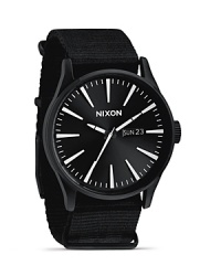 Sold and streamlined, this matte black watch from Nixon is a perfect fusion of performance and design. Designed for durable style, it flaunts a nylon strap, advanced movement and date and day feature. Sold and streamlined, this matte black watch from Nixon is a perfect fusion of performance and design. Designed for durable style, it flaunts a nylon strap, advanced movement and date and day feature.