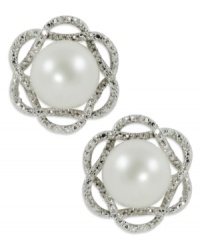 Elegance is always in season, just like this pair of sterling silver stud earrings. Cultured freshwater pearls (9-10 mm) and round-cut diamonds (1/10 ct. t.w.) give the pair of flower earrings a stylish touch. Approximate diameter: 5/8 inch. Elegance is always in season, just like this pair of sterling silver stud earrings. Cultured freshwater pearls (9-10 mm) and round-cut diamonds (1/10 ct. t.w.) give the pair of flower earrings a stylish touch. Approximate diameter: 5/8 inch.