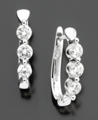 Sparkling, sculptural style. Three round-cut diamonds (1 ct. t.w.) are a chic contrast to 14k white gold. Diamond earrings diameter measures 3/4 inch. Sparkling, sculptural style. Three round-cut diamonds (1 ct. t.w.) are a chic contrast to 14k white gold. Diamond earrings diameter measures 3/4 inch.