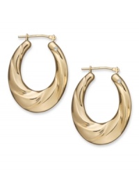 Gold. Glam. Gorgeous. Every girl needs a pair of hoop earrings, and Signature Gold's™ diamond-accented pair couldn't be more perfect. Crafted in 14k gold with a chic oval shape and draped design. Approximate drop length: 1-1/8 inches. Approximate drop width: 3/4 inch. Gold. Glam. Gorgeous. Every girl needs a pair of hoop earrings, and Signature Gold's™ diamond-accented pair couldn't be more perfect. Crafted in 14k gold with a chic oval shape and draped design. Approximate drop length: 1-1/8 inches. Approximate drop width: 3/4 inch.