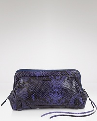 Rebecca Minkoff crafts a piece for the party animal with a polished side. In exotically embossed leather, this clutch is ready to get a little wild. Rebecca Minkoff crafts a piece for the party animal with a polished side. In exotically embossed leather, this clutch is ready to get a little wild.