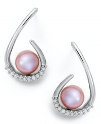 Sweeping elegance. J-shaped drops in sterling silver cradle pretty pink cultured freshwater pearls (8 mm) and sparkling, round-cut diamonds (1/6 ct. t.w.). Approximate drop: 7/8 inch. Sweeping elegance. J-shaped drops in sterling silver cradle pretty pink cultured freshwater pearls (8 mm) and sparkling, round-cut diamonds (1/6 ct. t.w.). Approximate drop: 7/8 inch.