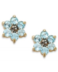 Spring forward. Victoria Townsend's sweet flower studs feature round-cut blue topaz (1-1/3 ct. t.w.) set in 18k gold over sterling silver. Approximate diameter: 3/8 inch. Spring forward. Victoria Townsend's sweet flower studs feature round-cut blue topaz (1-1/3 ct. t.w.) set in 18k gold over sterling silver. Approximate diameter: 3/8 inch.