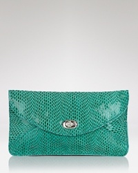 And the envelope goes to. In embossed leather, Sorial's clutch will bring an exotic shot of texture to your wardrobe. It's an award-winning choice day or night. And the envelope goes to. In embossed leather, Sorial's clutch will bring an exotic shot of texture to your wardrobe. It's an award-winning choice day or night.