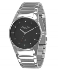 Streamline your style. This sleek KCNY watch features a smooth stainless steel bracelet and round case. Matte black dial with luminous stick indices, logo and date window. Analog movement. Water resistant to 30 meters. Limited lifetime warranty. Streamline your style. This sleek KCNY watch features a smooth stainless steel bracelet and round case. Matte black dial with luminous stick indices, logo and date window. Analog movement. Water resistant to 30 meters. Limited lifetime warranty.