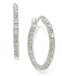 A girl can never have too much sparkle. Victoria Townsend's stunning hoop earrings are set in sterling silver with round-cut diamond accents that truly dazzle. Approximate diameter: 1 inch. A girl can never have too much sparkle. Victoria Townsend's stunning hoop earrings are set in sterling silver with round-cut diamond accents that truly dazzle. Approximate diameter: 1 inch.