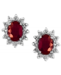 Regally red. EFFY Collection's stunning stud earrings feature oval-cut rubies (2-1/10 ct. t.w.) surrounded by halos of round-cut diamonds (1/2 ct. t.w.). Set in 14k white gold. Approximate length: 1/3 inch. Approximate width: 3/8 inch. Regally red. EFFY Collection's stunning stud earrings feature oval-cut rubies (2-1/10 ct. t.w.) surrounded by halos of round-cut diamonds (1/2 ct. t.w.). Set in 14k white gold. Approximate length: 1/3 inch. Approximate width: 3/8 inch.