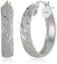 Sterling Silver Tarnish-Free Diamond-Cut Small Hoop Earrings (0.75 Diameter) Sterling Silver Tarnish-Free Diamond-Cut Small Hoop Earrings (0.75 Diameter)