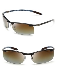 Fast track these Ray-Ban sunglasses with loads of sporty, performance details: polarized lenses, ultra-light frames and form-fitting rubberized ear pieces. Fast track these Ray-Ban sunglasses with loads of sporty, performance details: polarized lenses, ultra-light frames and form-fitting rubberized ear pieces.